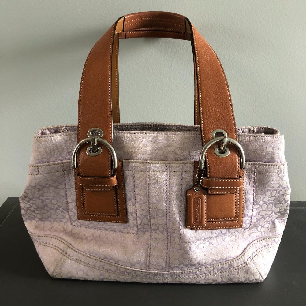 Coach purse, pink with brown handle, silver buckles